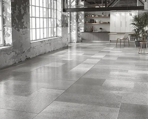 Betonlook PVC vloer met industriële grijze textuur in minimalistisch loft interieur